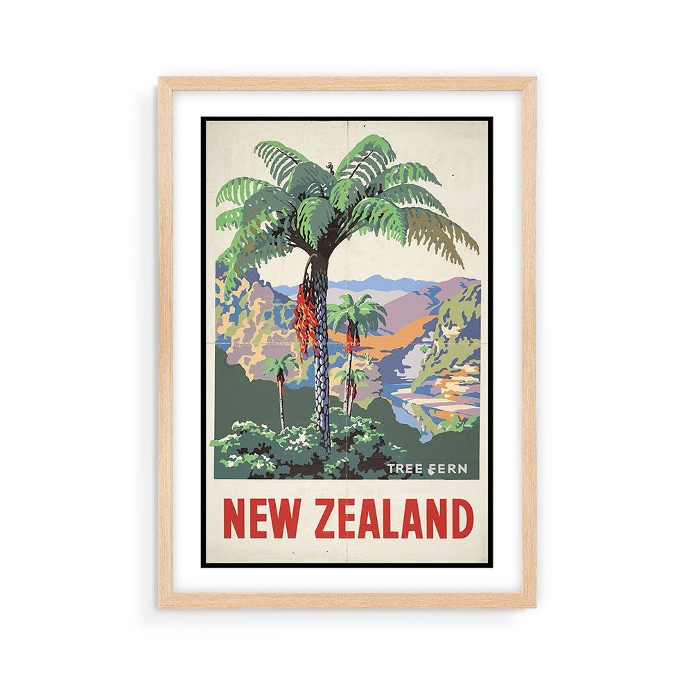 The Tree Fern Tourist Print is a framed archival travel poster featuring an illustrated tree fern, mountains, and river, with NEW ZEALAND boldly displayed—perfect for fans of collectible posters.
