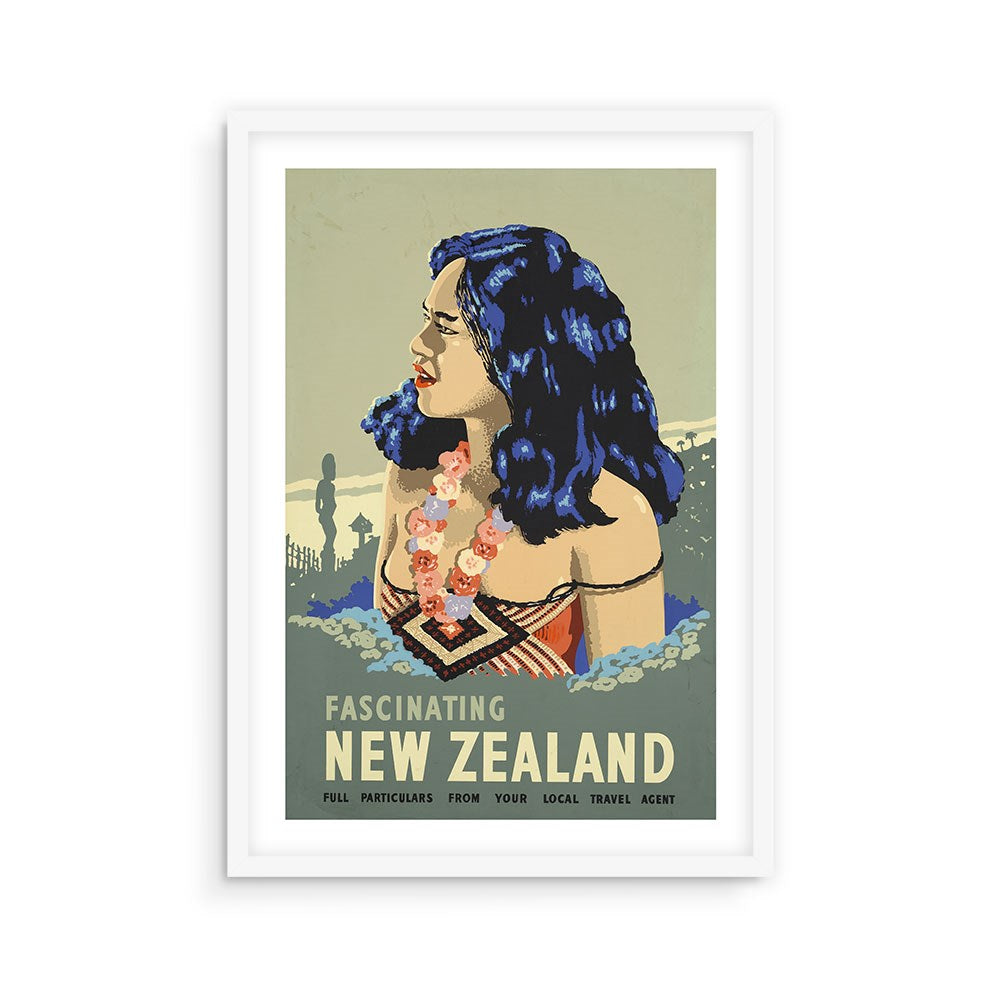 The Fascinating NZ Tourist Print is a vintage-style archival poster of a woman with blue hair, floral lei, and traditional Māori attire, featuring “Fascinating New Zealand” text and travel info, elegantly framed in white.