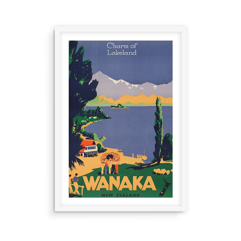The Wanaka Tourist Print is a framed vintage-style New Zealand travel poster showing an illustrated lakeside with mountains, trees, water, and people. It reads "Charm of Lakeland" at the top and "WANAKA NEW ZEALAND" at the bottom.