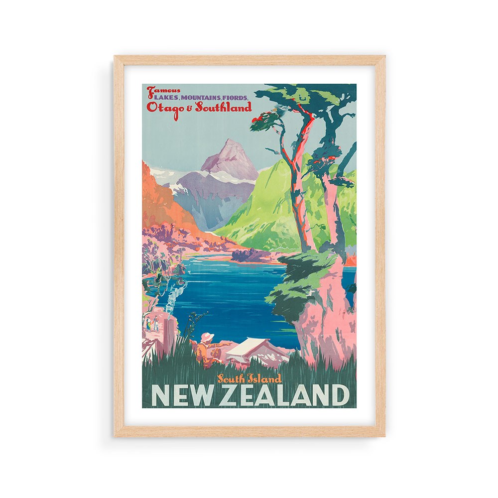 The South Island NZ Tourist Print is a framed vintage-style archival print showing a colorful landscape of lakes, mountains, and trees labeled Otago & Southland—ideal for collectors of classic New Zealand posters.