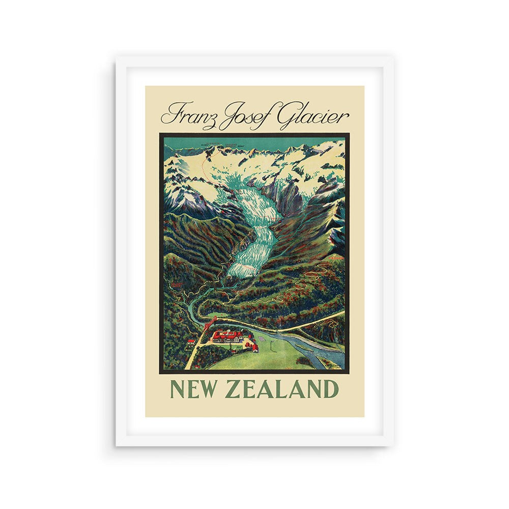 The Franz Josef Glacier Tourist Print features a framed vintage poster with an illustrated aerial view of New Zealand’s Franz Josef Glacier, highlighting ice, mountains, forest, and a building. The artwork reads: “Franz Josef Glacier, New Zealand.”.