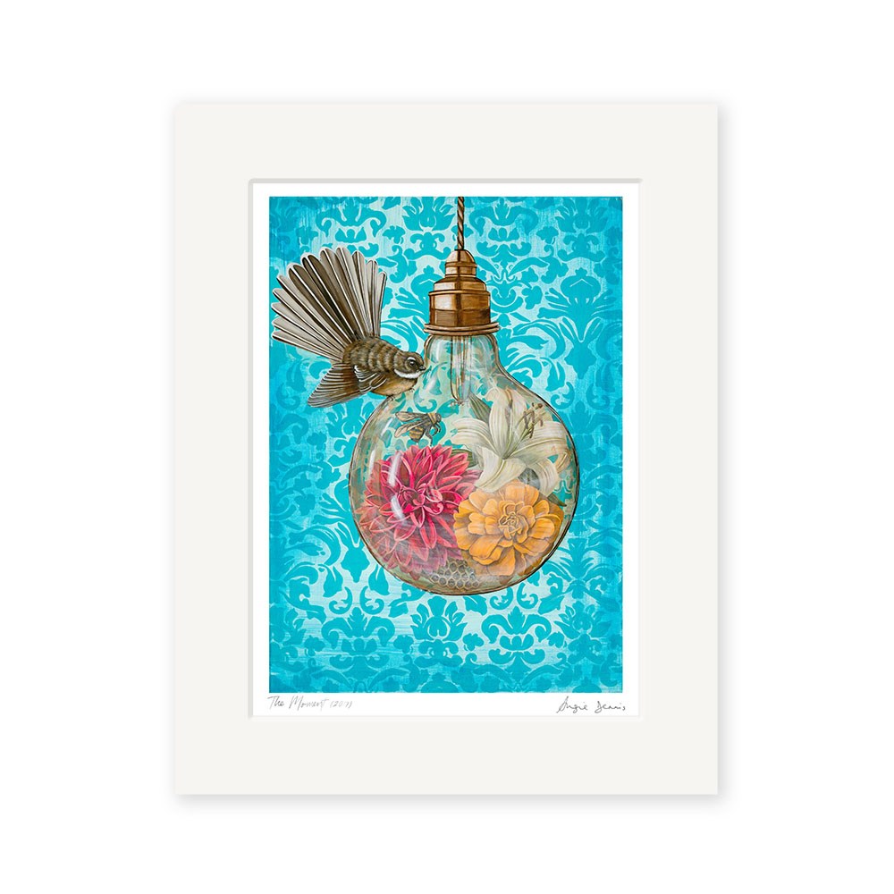 The Moment Art Print by Angie Dennis features a light bulb with flowers and a bird’s wing on a turquoise damask background. This signed, archival-quality New Zealand art print makes a striking addition to any space.