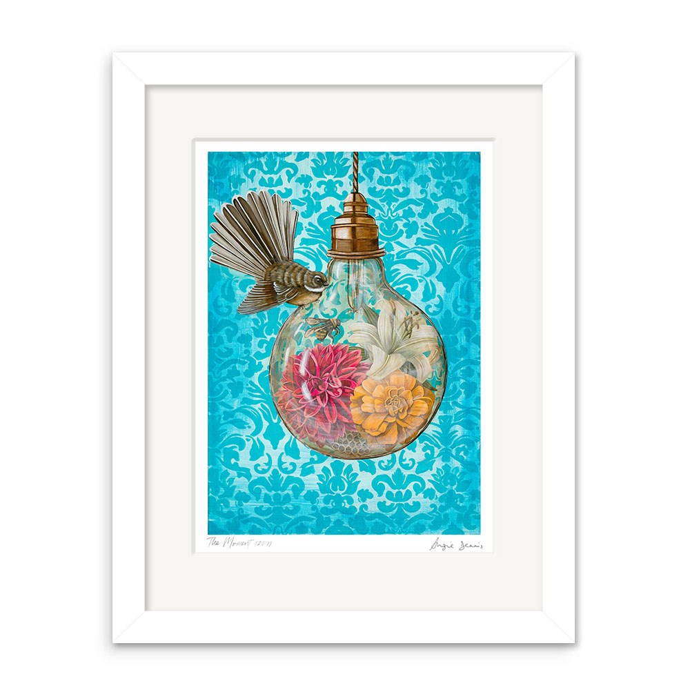 Angie Dennis - The Moment Art Print features a hummingbird near a light bulb filled with flowers on matte paper, set against a blue damask background—a stunning piece of New Zealand art.