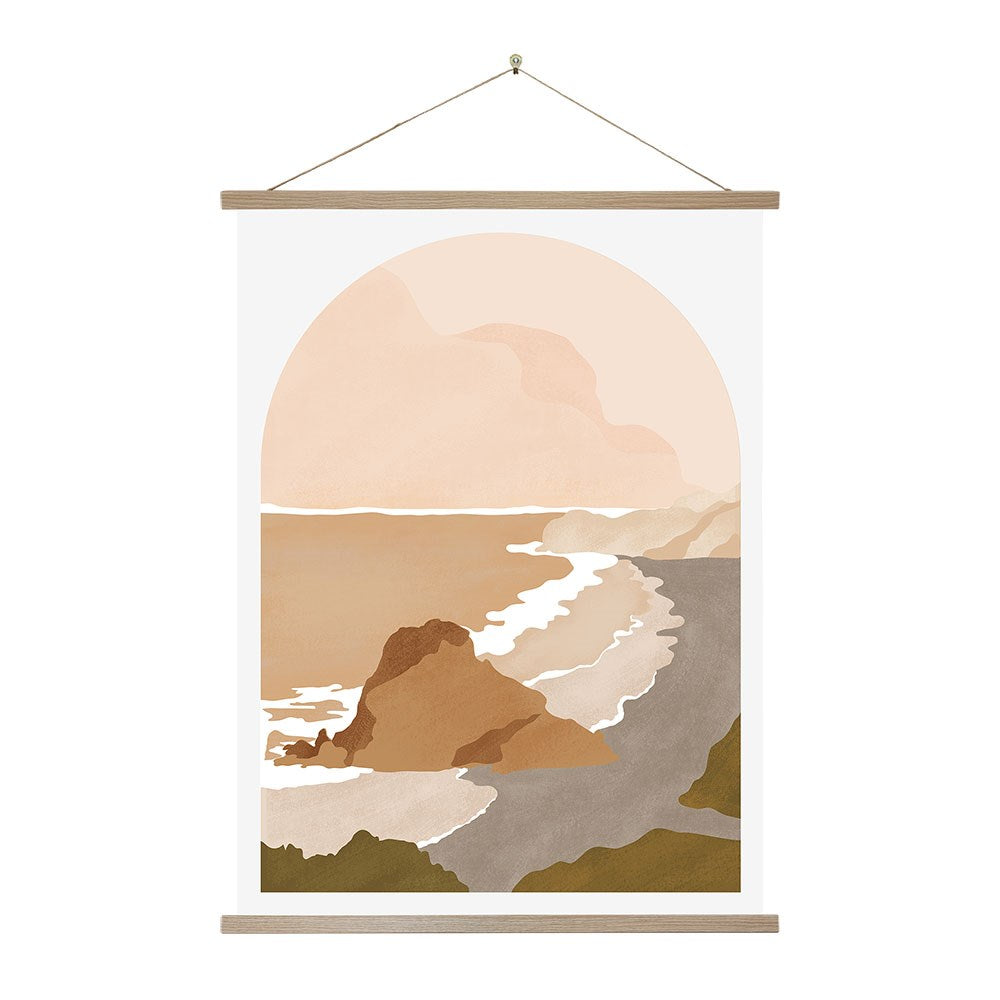The Piha Landmark Wall Chart is a minimalist art print showing a New Zealand coastal landscape—cliffs, waves, and sandy beach in soft brown and beige tones. It comes framed with wooden bars and strung for instant display.