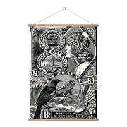 NZ Stamp Wall Chart: A black and white wall poster featuring vintage NZ stamp art—crowned woman’s profile, native birds, landscapes in various denominations—framed with wooden batons. Made in New Zealand.