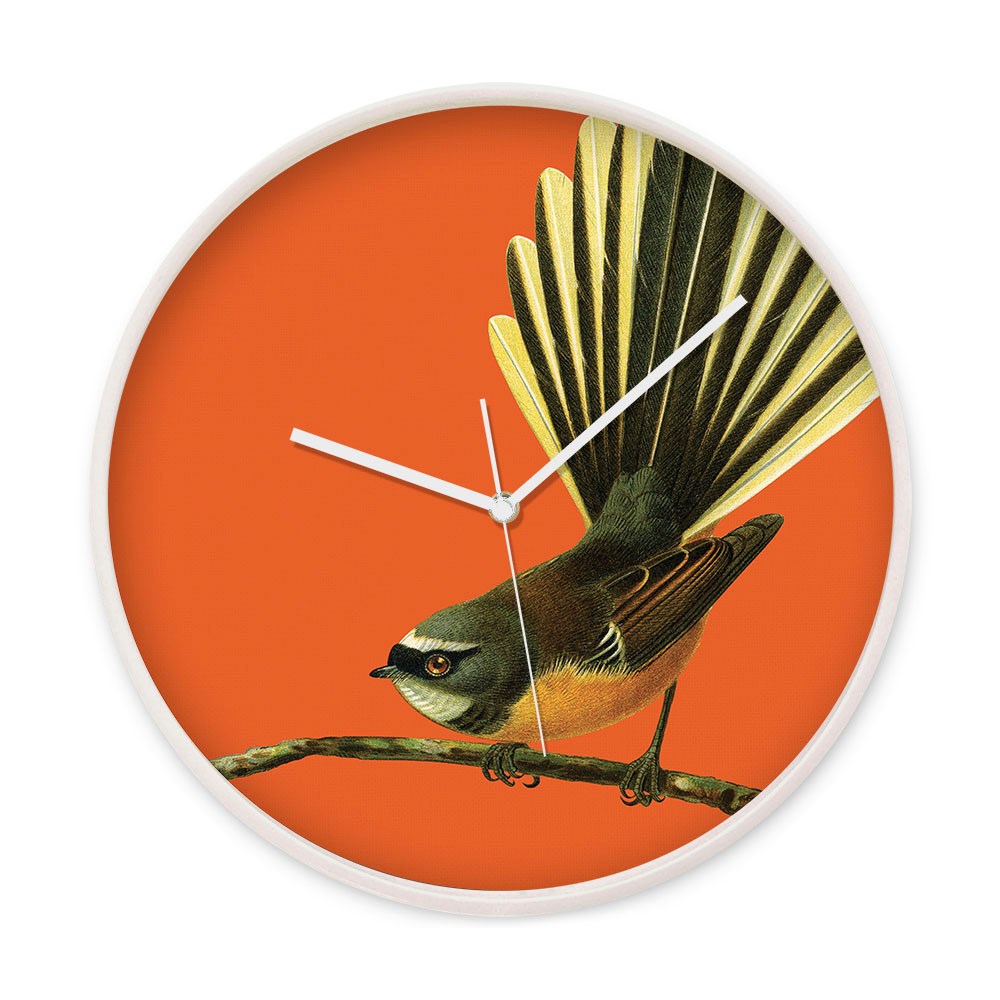 The Bright Fantail Wooden Frame Clock features silent movement and a vivid illustration of a small bird with a fanned tail on an orange background, accented by white clock hands.