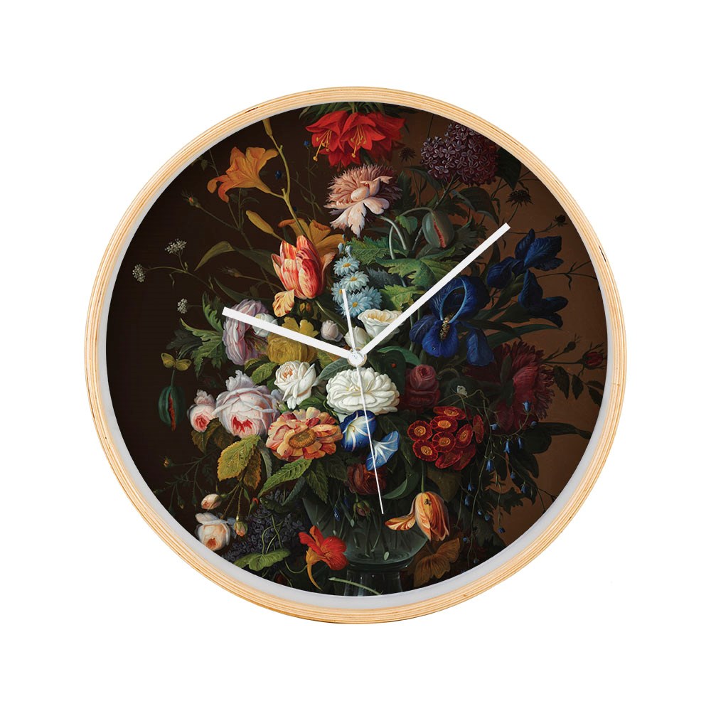 The Vintage Flowers Wooden Frame Clock features a silent movement and a detailed vintage floral background. White hour and minute hands pop against the design, while its minimalist style excludes numbers or markings.