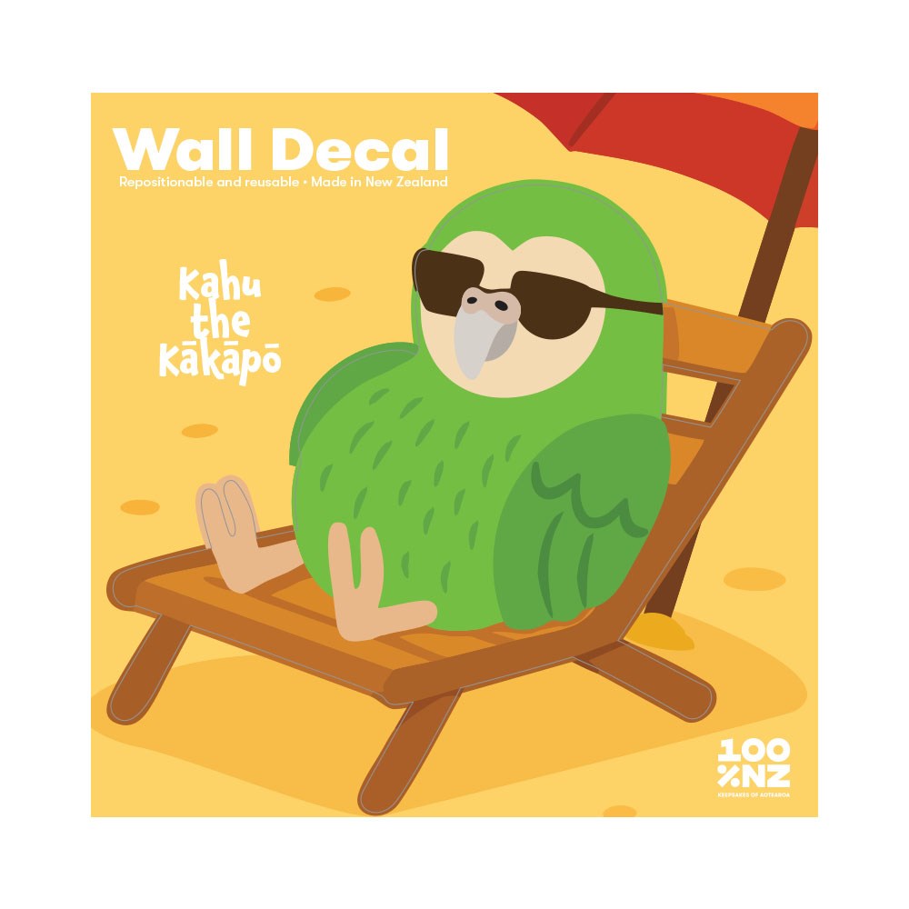 Kakapo Wall Decal: Illustration of Kahu the green kākāpō in sunglasses, relaxing on a beach chair under a red umbrella. Matte fabric peel-and-stick wall decal, made in New Zealand. Text reads "Wall Decal" and "Kahu the Kākāpō.