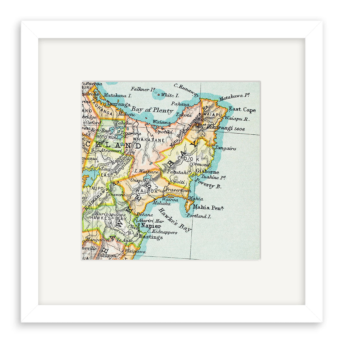 Hawkes Bay Vintage Map Print—framed giclee print of a vintage lithograph map showing New Zealand’s North Island northeast coast, including Bay of Plenty, East Cape, and labeled towns, with white mat and frame.