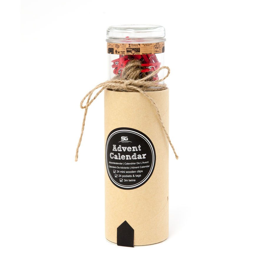 The Advent Calendar is a cylindrical kraft paper container in a craft style, featuring a black and white “Advent Calendar” label, a clear jar lid with wrapped items inside, and twine tied around the middle.
