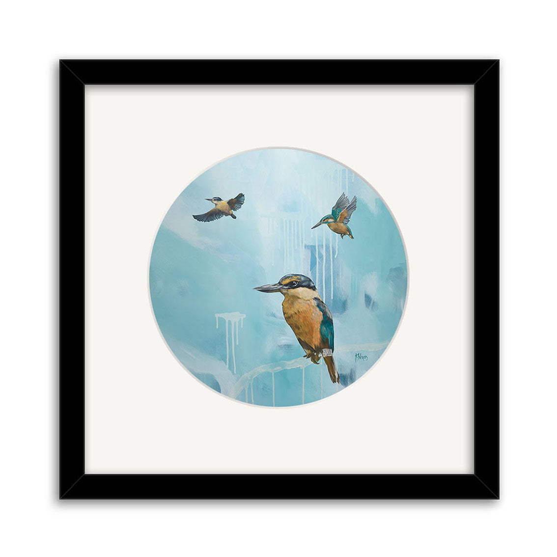 A small art print, I Guess thats why they call it the Blues by Kirsty Nixon, features three kingfishers against a light blue background in a black frame with white mat, inspired by New Zealand’s wildlife.