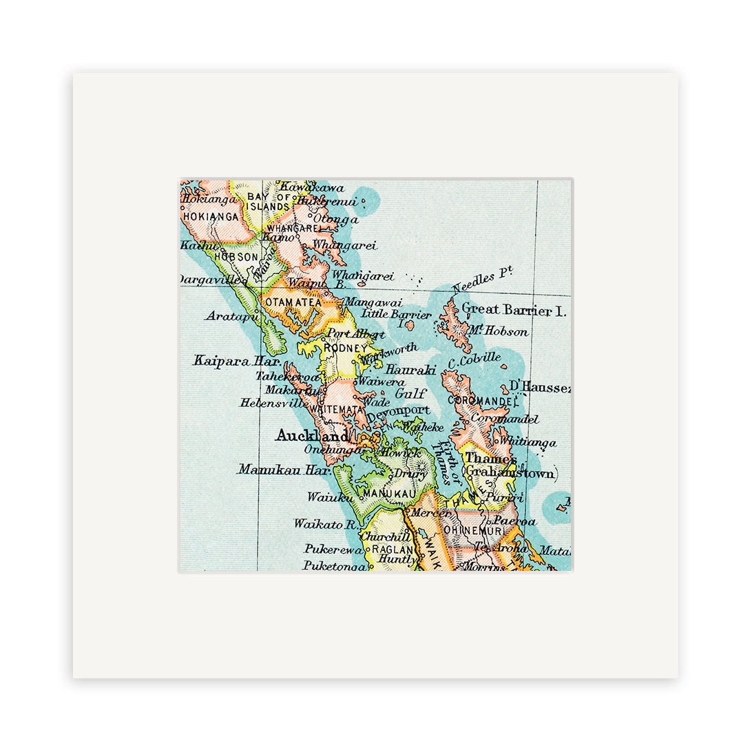 The Auckland Vintage Map Print displays a detailed lithograph of northern New Zealand’s North Island, featuring Auckland, Kaipara, Manukau Gulf, and Great Barrier Island, all with a classic white border.