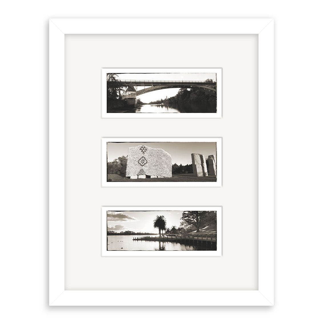 The Hamilton Triptych - RP095 features three New Zealand prints by Reuben Price—bridge over water, stone monument, and lake scene—presented in a white frame with horizontal mat openings on archival matte paper.