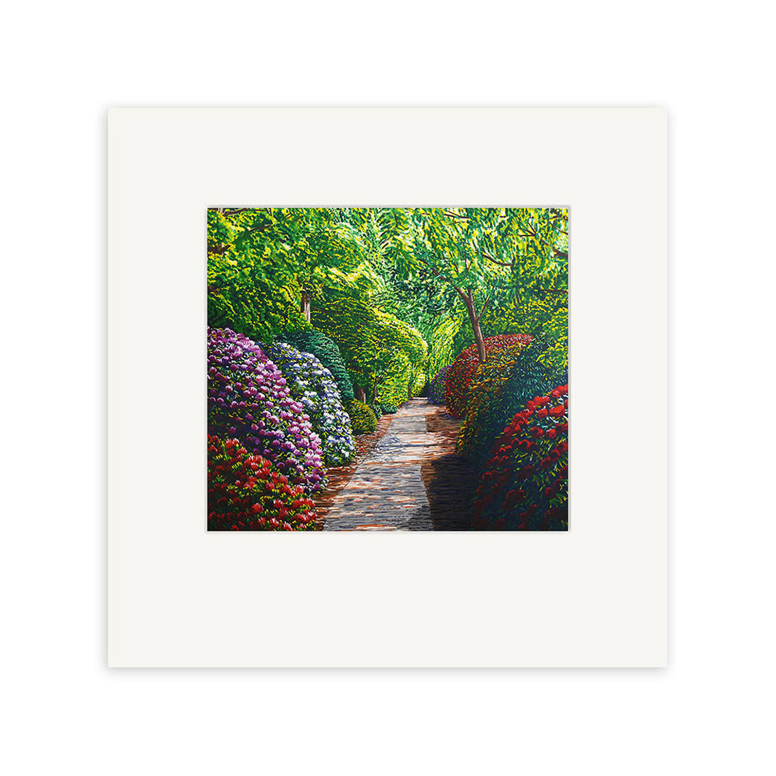 The Karl Maughan Riverhead Small Art Print features a garden path bordered by vibrant red, purple, and white flowers, with green trees overhead and sunlight filtering through the leaves.