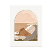 The Piha Landmark Art Print depicts a minimalist view of a rocky New Zealand coastline with waves and cliffs, framed by an arched white border. Part of the Landmark Collection, it features muted earth tones of beige, brown, and green.