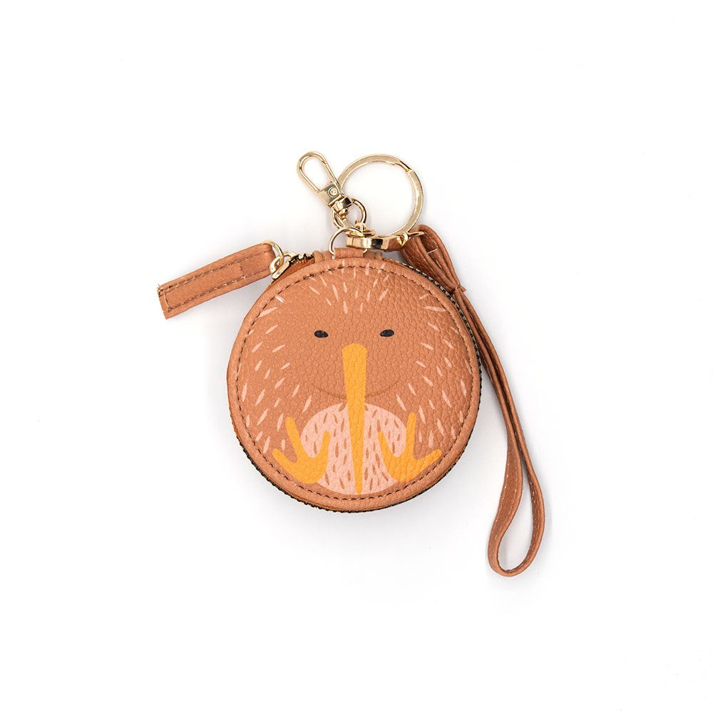 The Kiwi Cutie Coin Purse is a small, round, light brown accessory with a wrist strap, key ring, zipper closure, and a cute stylized kiwi bird face on the front—perfect for fashion lovers seeking secure storage.