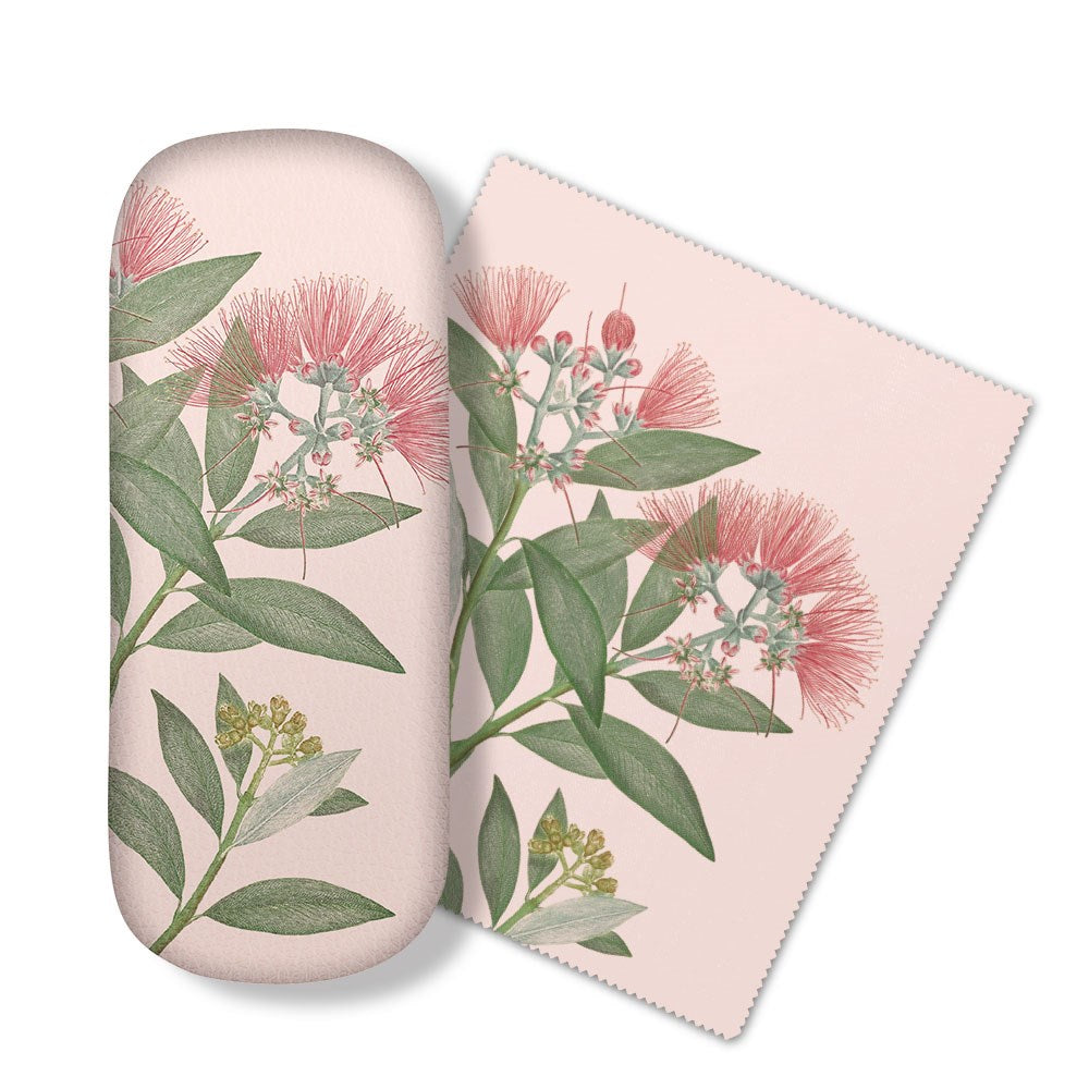 The Vintage Botanical Pohutukawa Glasses Case includes a light pink case and matching microfibre cloth with green leaves and pinkish-red flowers—ideal for cleaning glasses or electronics screens.