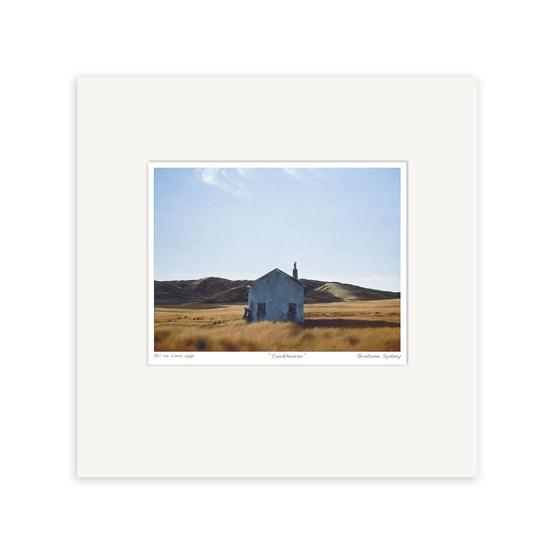 The Grahame Sydney - Family Trees, Gimmerburn Road Small Art Print depicts a small white house amid tall grass with rolling hills and a blue sky, evocatively presented with a wide white mat border.