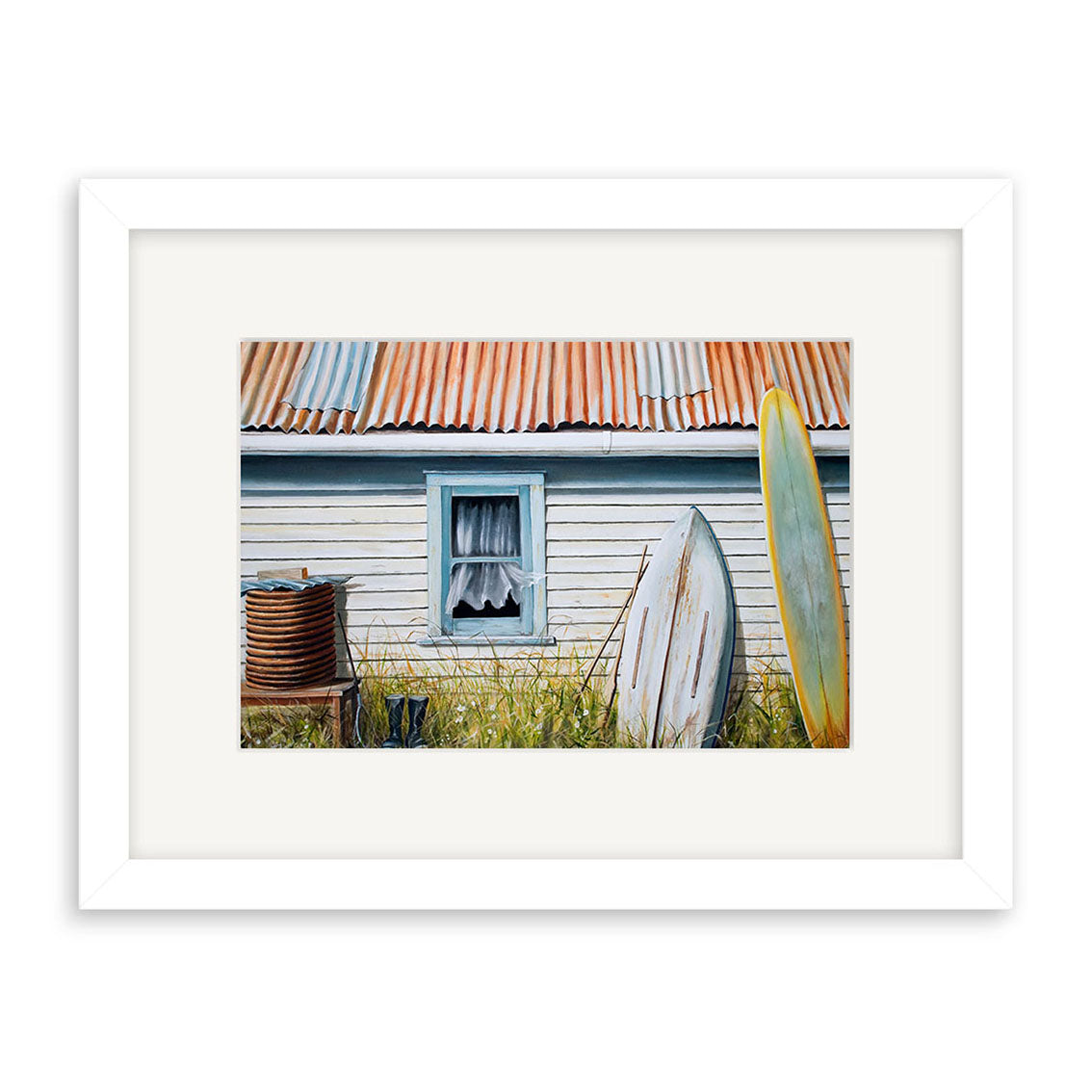 The Back of the Bach Small Art Print by New Zealand artist Graham Young depicts a weathered house with a rusty roof, lace-curtained window, surfboards, and overgrown grass—a striking piece for any art collection.