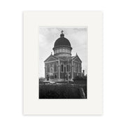 Archival black and white photographic print of Stmarys Basilica 1925 - HI136, showing the large brick church with domed roof, cross, arched windows, and ornate details. Surrounded by shrubbery under a cloudy sky, it captures New Zealands heritage.