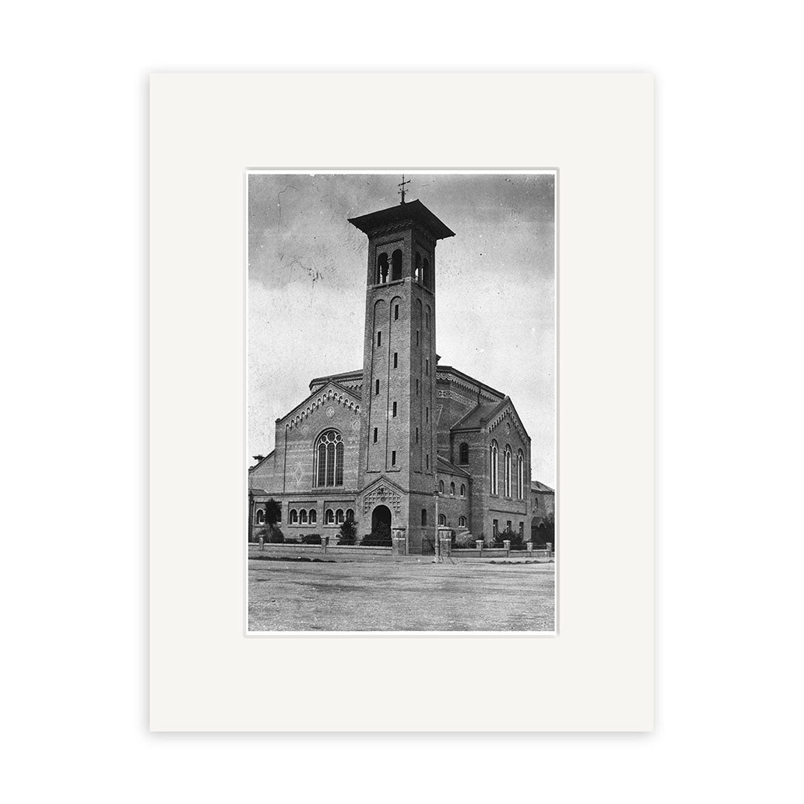 Black and white photo of First Church 1924 - HI137 with tall square bell tower, arched windows, and gabled roof. This historical photographic print on archival matte paper captures the empty brick building in timeless detail.
