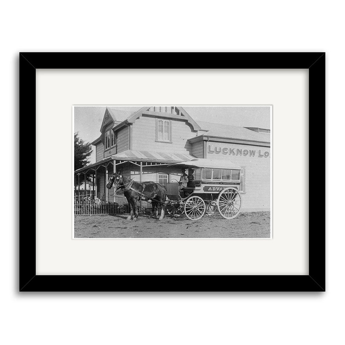 Archival quality black and white photo titled Lucknow Lodge 1900 - HI167 depicts a horse-drawn carriage and driver in front of the wooden Lucknow Lodge, an early New Zealand historical photographic print.