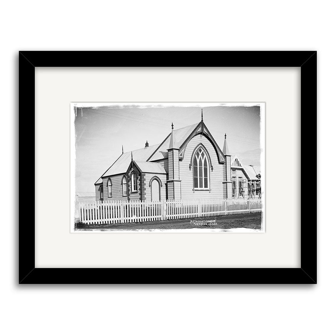 Archival quality black and white print of Wesley Methodist Church 1918 (HI202), New Zealand, featuring pointed arches and a tall window, shown in a black frame with white mat.