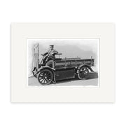 The City Council Electric 1920s - HI211 print captures a man in uniform on an early electric utility vehicle labeled Christchurch City Council Electric, with large wheels and an open cab, in New Zealand.