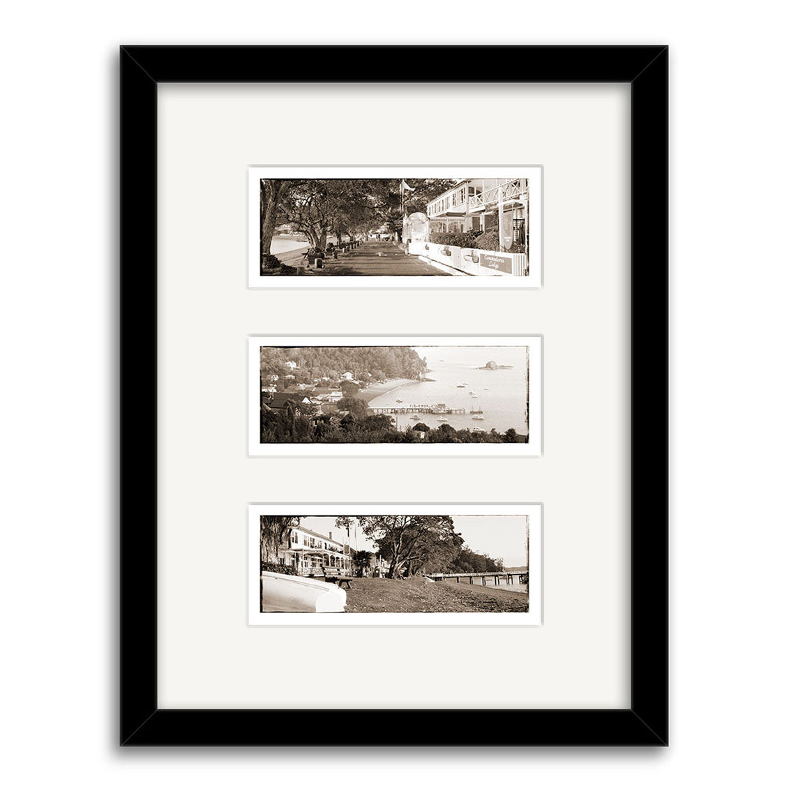 Russell Triptych - RP028: A black-framed display with three archival-quality, sepia panoramic prints of outdoor scenes—buildings, trees, and waterfront—separated by a wide white mat.