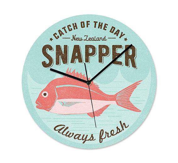 The NZ Seafood Snapper Frameless Clock features an illustrated red snapper on a blue background with “Catch of the Day, New Zealand Snapper, Always fresh” text. Designed in New Zealand with silent movement and hands pointing to 10:09.