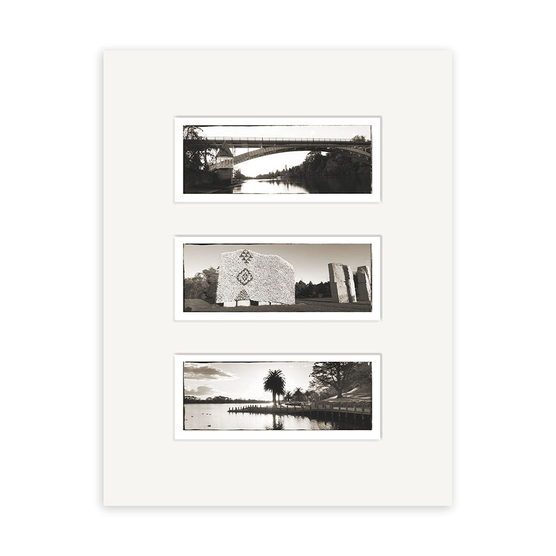 The Hamilton Triptych - RP095 features three black-and-white New Zealand photos on a white mat: a bridge over water, a carved stone monument, and a waterfront scene with trees and a palm, all arranged vertically.