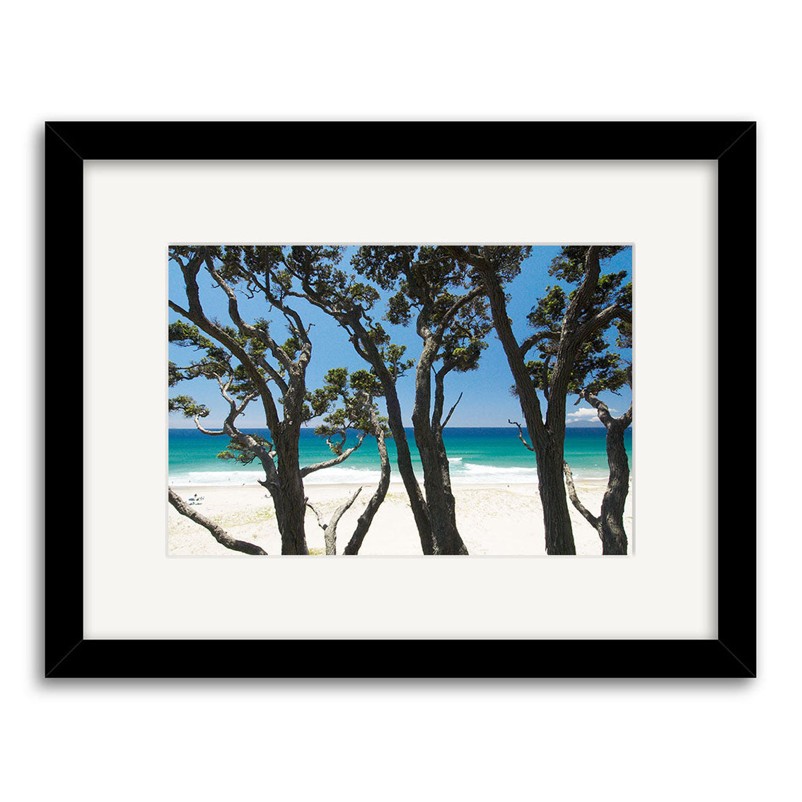 Immerse yourself in Pakiri Beach - RP143: a framed photo featuring dark tree trunks, white sand, turquoise water, and blue sky, available as archival-quality matte paper photographic prints.