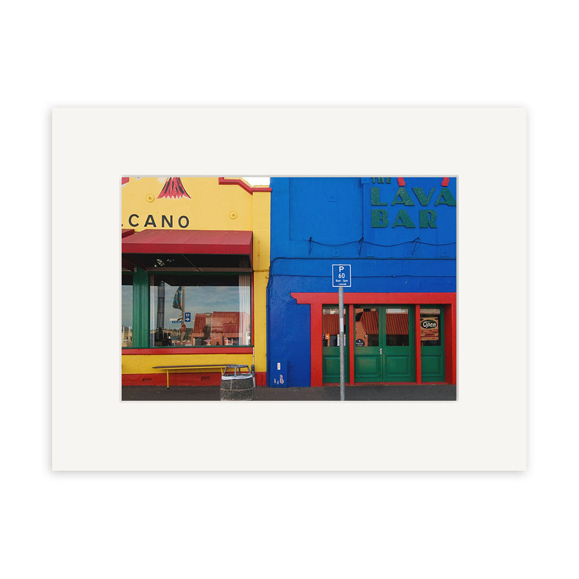 A photograph titled Lyttelton - RP173 shows two adjacent New Zealand storefronts—a yellow building with the CANO sign and a blue LAVA BAR—plus a green bench and handicap sign, available as archival quality photographic prints.