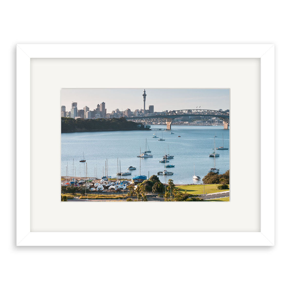 Little Shoal Bay - RP229: Framed photographic print of a New Zealand harbor with sailboats, a bridge, and city skyline. Printed on archival-quality matte paper for lasting beauty.