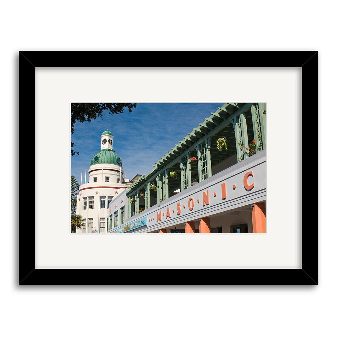 A framed photograph titled Napier - RP255 features a building with MASONIC in large letters and a white dome with green accents against a blue sky. Printed on archival quality matte paper.