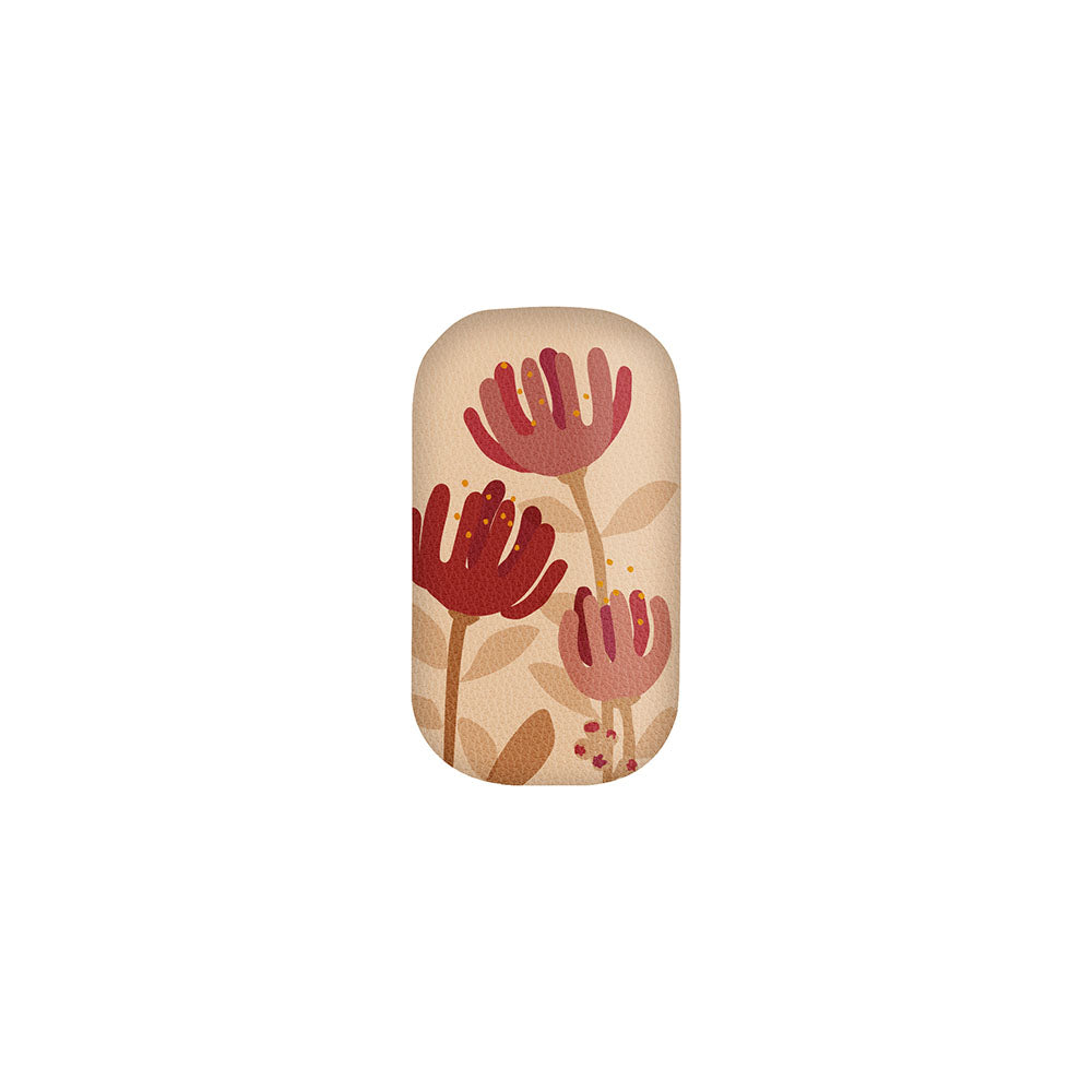 The Raw Pohutukawa Trinket Box, a rectangular item with rounded edges, showcases red and pink stylized flowers with beige stems and leaves on a light beige background—making it a perfect gift.