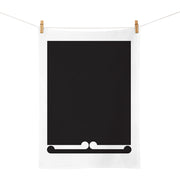 The Gordon Walters - Untitled 1973 Tea Towel, designed in New Zealand, is a white cotton towel featuring a bold black rectangle with a decorative white scroll along the bottom edge, inspired by Gordon Walters’ iconic style.