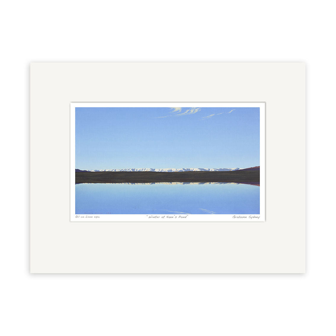 A photograph titled Grahame Sydney - Winter at Kanes Pond Small Art Print shows a tranquil lake and snow-capped mountains under a clear sky, mounted on a white mat with label and signature—ideal for collectors of NZ art or Grahame Sydney prints.