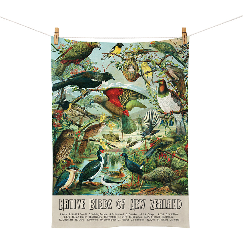 The NZ Native Birds Tea Towel features a vibrant illustrated poster of native birds perched on branches and near water, each numbered and named at the bottom—a perfect display piece or functional kitchen accessory.