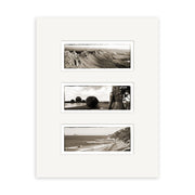 The Hawkes Bay Triptych - RP135 features three black-and-white panoramic prints, vertically arranged on archival matte paper, showing mountains, a statue amid shrubbery, and New Zealand coastal cliffs with waves.