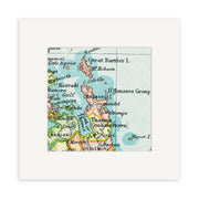 A close-up of the Coromandel Vintage Map Print displays Great Barrier Island, Thames (Grahamstown), and surrounding areas of New Zealand, elegantly presented in a white square mat frame.