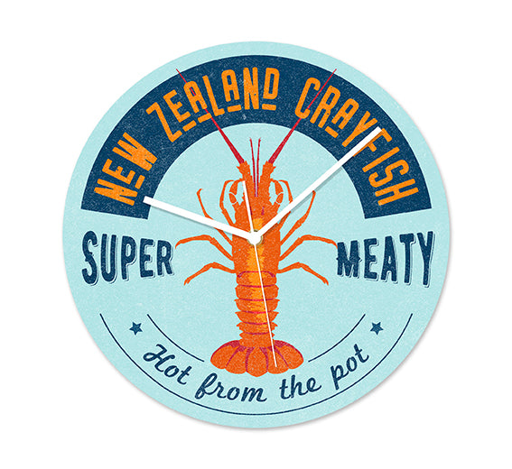 The NZ Seafood Crayfish Frameless Clock showcases a crayfish illustration with “NEW ZEALAND CRAYFISH SUPER MEATY Hot from the pot” text. Its light blue design includes silent movement and white hands.