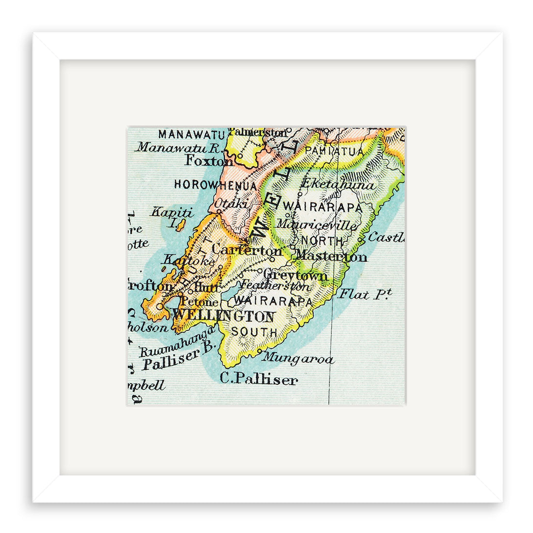 The Wellington Vintage Map Print is a framed giclee featuring New Zealand’s North Island, highlighting Wellington, Wairarapa, Palmerston North, and Kapiti in colored regions with place names in a 19th-century lithograph style.